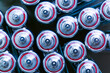 Battery,Closeup of pile of used alkaline batteries. Close up colorful rows of selection of AA batteries energy abstract background of colorful batteries. Alkaline battery aa size. Several batteries in