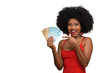 © Edson Souza - woman holding money, young woman holding brazilian money.