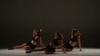 Group of three women dancing heels dance in a studio. Plain shadowed background, spotlight. Black sexy costume, high heels. Modern sensual choreography. Full length.