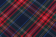 Close-up Texture Tartan Scottish Style Checkered Fabric Green, Red And Blue Colors Tilted. Image For Your Design
