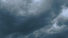 Hurricane Gray Clouds. Puffy Fluffy Dark Clouds. Cumulus Cloudscape Real Time Footage. Autumn Or Winter Sky 4k Video. Nature Weather Forecast. Rainy Cloud Background. Cloudy Dramatic Storm Or Cyclone