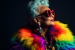 © Darya Lavinskaya - High fashion studio portrait of beautiful old woman wears sunglasses and colorful fur coat