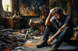 Depressed artist in unkempt workshop visibly grappling with emotional turmoil 