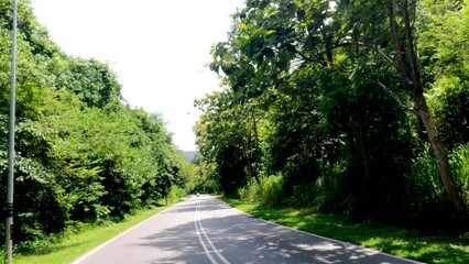 Wall Mural - Ride on a scenic highway on a tropical island