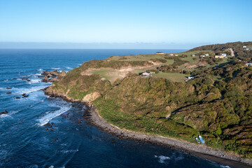 Wall Mural - Aerial View of a Rocky Point Looking out Towards the Pacific on Chiloe Island in Northern Patagonia Chile