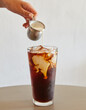 © Luis Garcia - Pouring milk over Iced Coffee