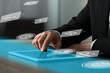 © New Africa - Marketing strategy. Man using tablet computer at table indoors, closeup. Many different icons above device