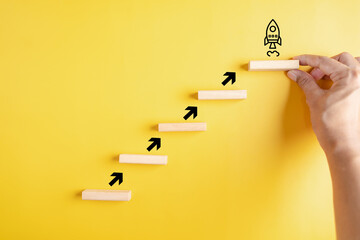 Poster - Business growth success achievement concept, hand of people arranging as step stair or ladder rocketship launch for planning development leadership and customer target group concept.