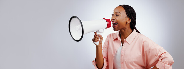 Wall Mural - Happy woman, megaphone and voice for announcement, broadcast or news of sale or discount on white background. African person with attention, noise and broadcast of winner in studio and banner space