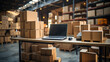 © Suralai - Office in warehouse with products, inventory, small business.