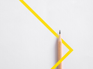 Wall Mural - Minimalist template of a wooden pencil combined with a yellow line on white background.