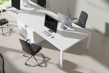 Top view of office workplace interior with pc desktop and armchairs
