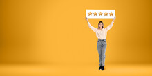 Happy Woman Holding Five Stars Sign
