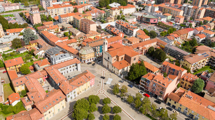 Wall Mural - Aerial view of the parish church of San Remigio in Vimodrone, in the metropolitan city and archdiocese of Milan, Italy. This Catholic place of worship is part of the deanery of Cologno Monzese.