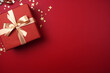 Christmas composition, Gift box, christmas decorations on red background, Flat lay, top view, copy space, aesthetic look