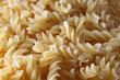 Close up image of beige lentil fusilli pasta