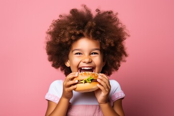 diverse girl with curly hair eating a vegan burger or burger on pink background. Restaurant, food delivery website horizontal banner.