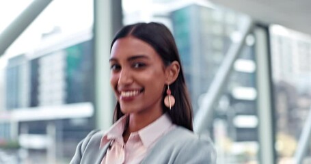 Poster - Crossed arms, walking and face of businesswoman in the office with confidence, pride and happiness. Wink, smile and portrait of a professional young female lawyer flirting in a modern workplace.