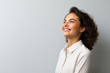 Happy Businesswoman Looking Away At Copy Space In Office