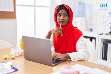 Sticker - Young beautiful woman business worker using laptop with relaxed expression at office