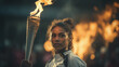 female sportswoman with the Olympic flame