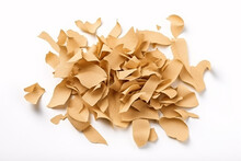 Isolated white sawdust, cardboard, and kraft paper shavings make up the perfect gift box filler.