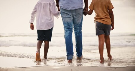 Wall Mural - Holding hands, legs of family on beach together for holiday and bonding on tropical adventure from back. Walking, summer vacation and father with children at ocean to relax, travel and fun in Cancun.