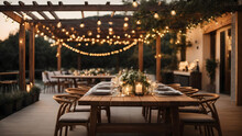 A Modern Outdoor Dining Area With A Pergola, String Lights, And A Long Wooden Table Set For A Stylish Evening Under The Stars.