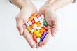 Healthcare, pills and hands of elderly person with capsules, medication and treatment in palm
