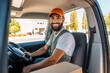 © yuliachupina - Shot of young man delivering a package while sitting in a vehicle
