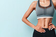 © Igor - Cropped image of an athletic woman with beautiful flat belly. ai generative