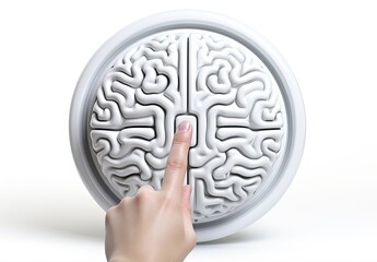 The concept of artificial intelligence. A hand pressing a button. Abstract button in the form of a plastic model of a brain. Turn on your brain and mind energy. Technologies of the future.