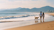 © alpha - 海辺で犬の散歩をするカップル