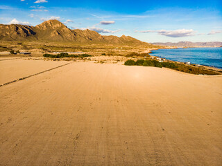 Wall Mural - Coast view with campers camping on sea shore, Spain