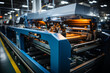 © The Picture House - Modern manufacturing equipment working on automated textile printing press