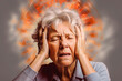 A gray-haired woman holds her head in pain. Headache, ringing in the ears, blood pressure. Precursors of stroke.