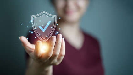 Wall Mural - woman holding shield protect icon. protection network security computer and safe your data concept, 
