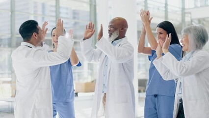 Wall Mural - Winning, high five and and applause by doctors and nurses with paper throw, breakthrough or target success in hospital. Medical, team and hands in support of partnership, thank you and collaboration