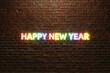 © mim232 - 3d text animation happy new year on a brick background. colorful neon sign happy new year 2024 in suitable for design business or flyer, advertising and etc .