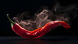 Smoky, very spicy red chili pepper on a black background. Close-up. Fiery and vibrant.