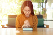 © natrot - Woman praying on holy bible. Woman hands folded in prayer on a holy bible. Christian prayer to god