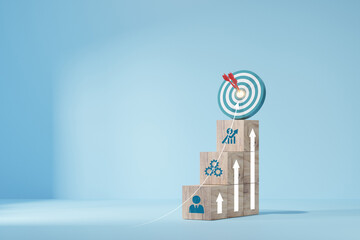 Wall Mural - woods block step on table with icon action plan. target icon on the top of wooden cube blocks. shini