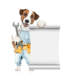Poster - Funny puppy wearing denim overalls with tool belt holds wrench and shows empty list. Isolated on white background