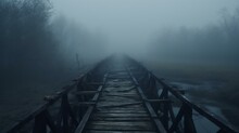 Scary Old Ruined Wooden Bridge In Foggy Blurred Forest Background