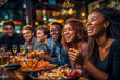 © michaelheim - Group of diverse friends enjoying a US sports game at a sports bar