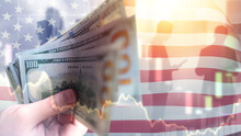 USA economy. Hands with money. American flag. Economic falling chart. Financial crisis. Problems in USA economy. Stock market crash. Economic collapse. USA economic crisis.