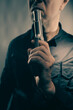 Mercenary hitman spy assasin with gun