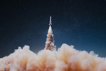 Fototapete - Launching a rocket with clouds of smoke in the starry sky at night. War and missiles weapons. Weapon Rocket successfully takes off into the sky