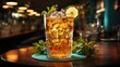 Refreshing iced tea with lemon slices and mint