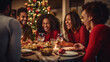 © MP Studio - Group of friends enjoying a lively Christmas dinner party, filled with laughter and good cheer, in a warmly lit room decorated for the holiday season.